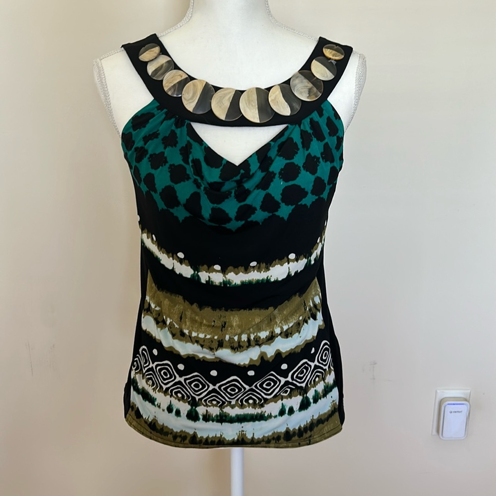 Multicolor Linda Segal tank top with round wooden discs across the neck.